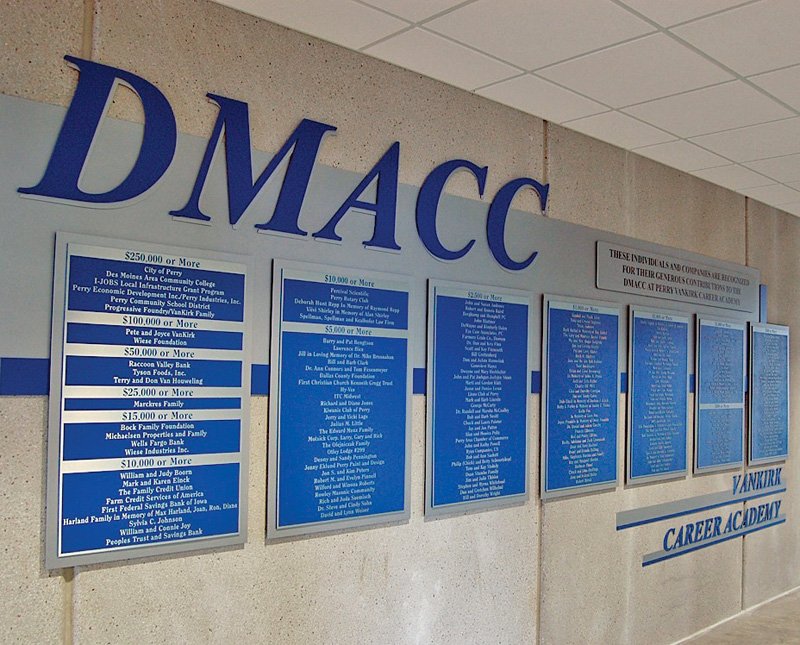 MACC donor wall with blue and silver aluminum lettering and zinc plaques