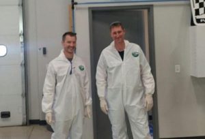  Brent Jansen and Cory Vande Kieft in white paint protection suits