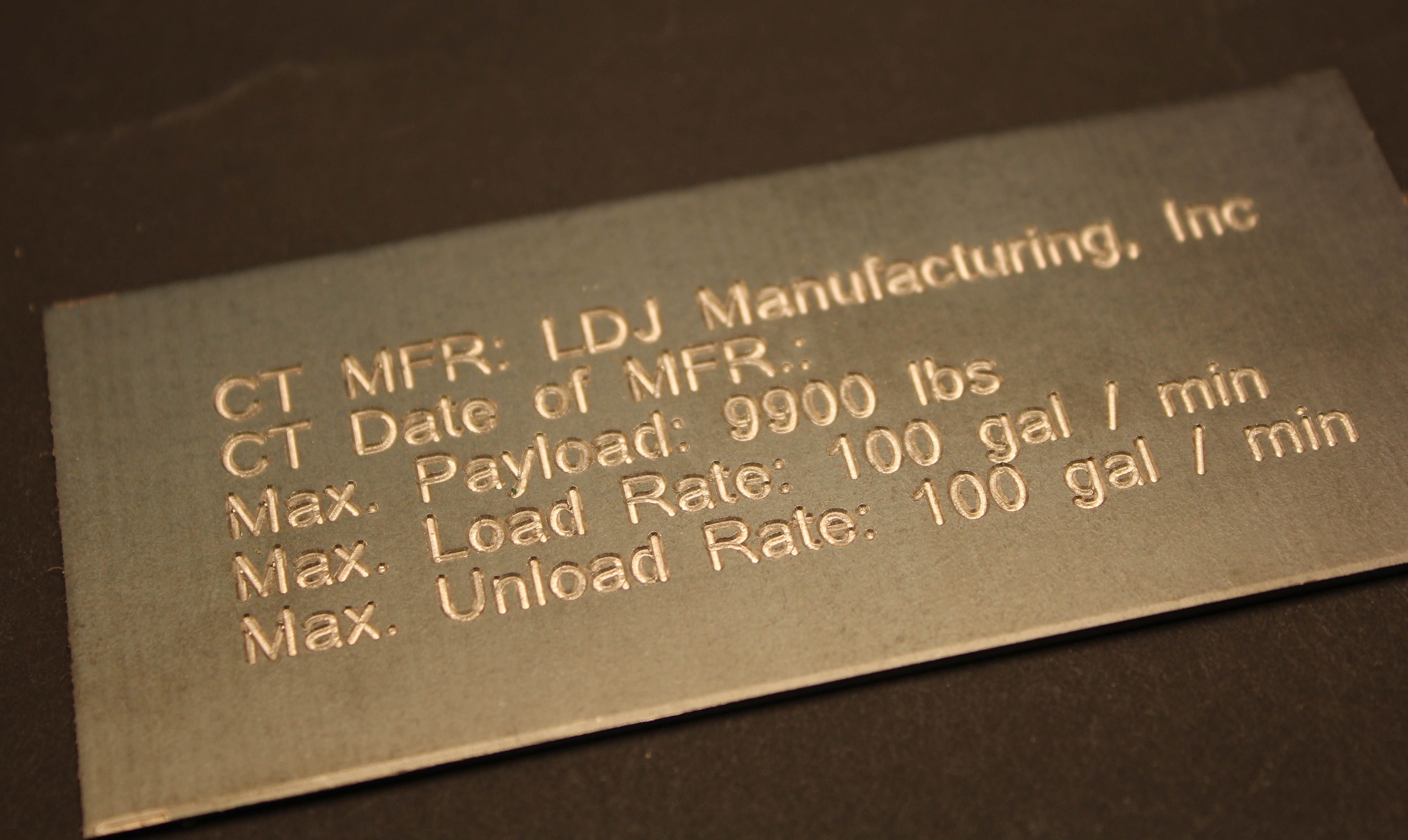 laserengravedsteelidtagindustrialtoolnameplate Pella Engraving