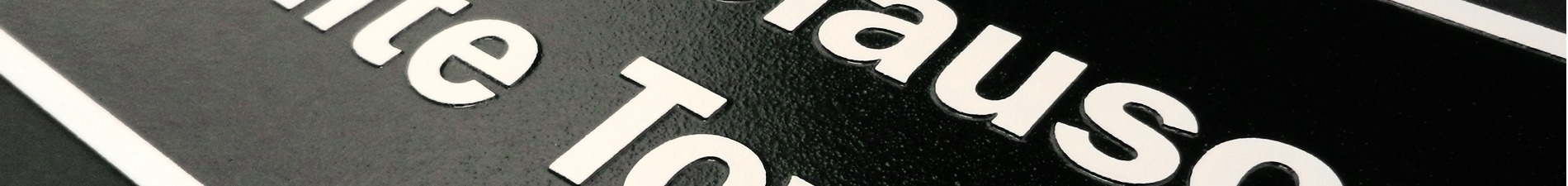 Header image closeup of Knoxville Raceway architectural signage