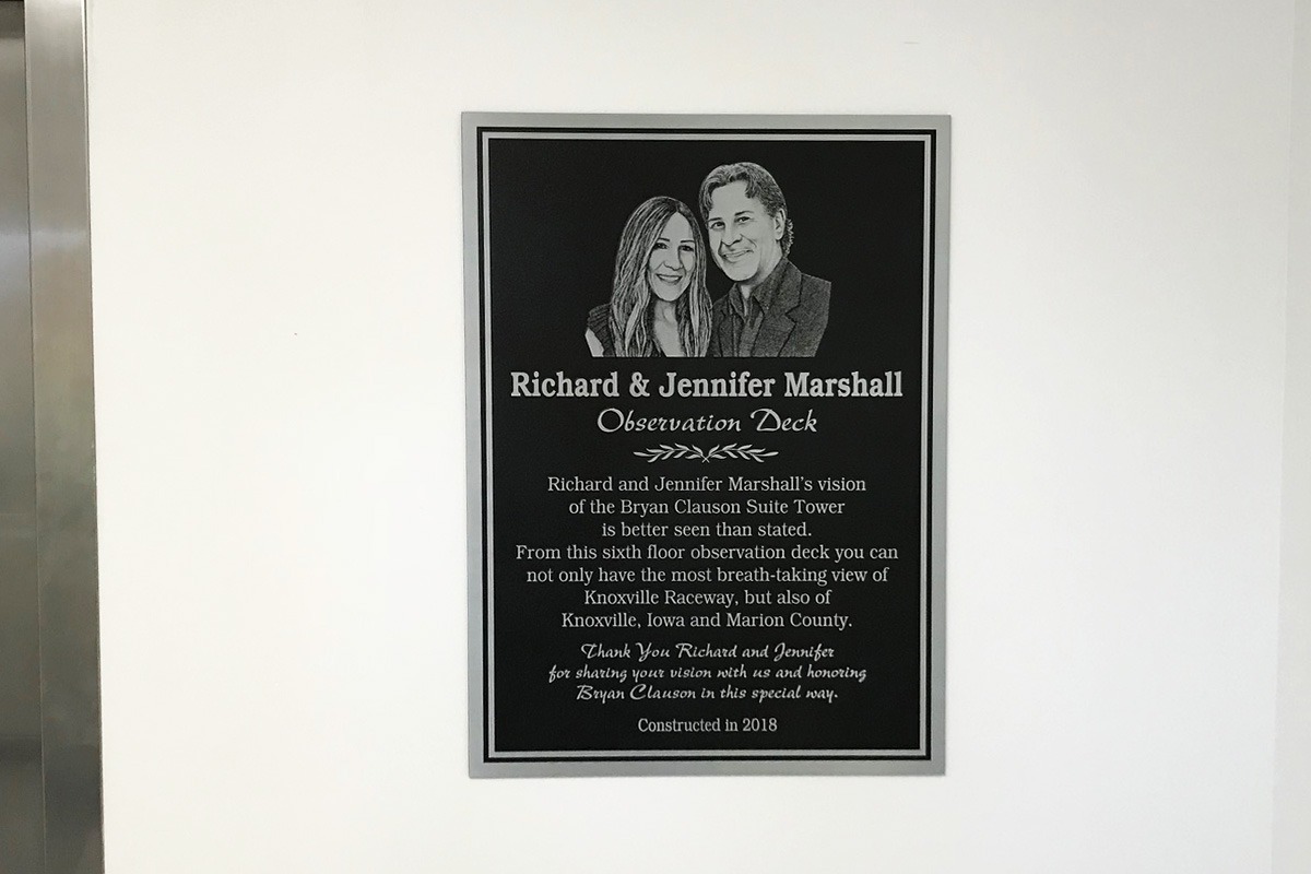 Indoor directional architectural signage with dedication plaque