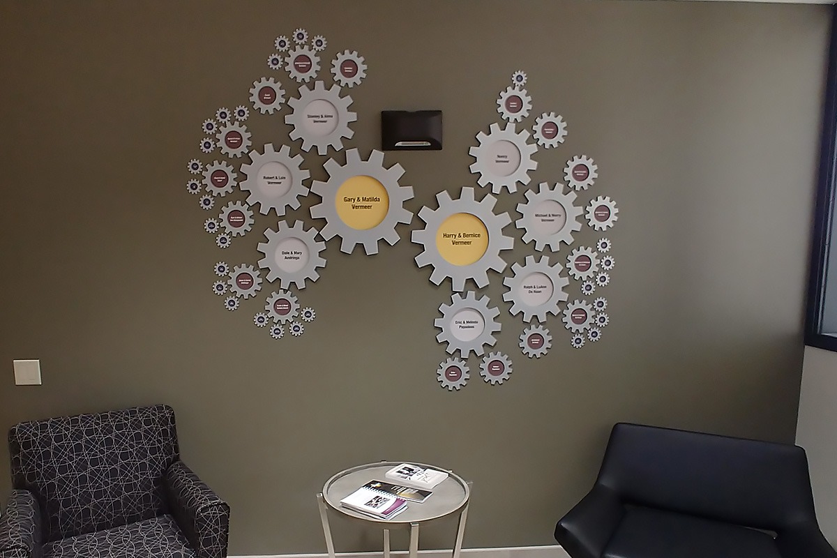 Vermeer family tree wall installation with gears