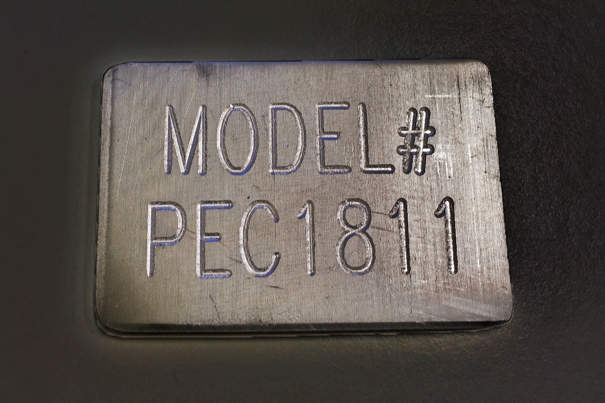 Tool-engraved steel model number tag