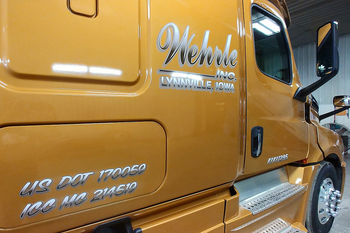 Silver Wehrle, Inc. logo vinyl decal on yellow truck