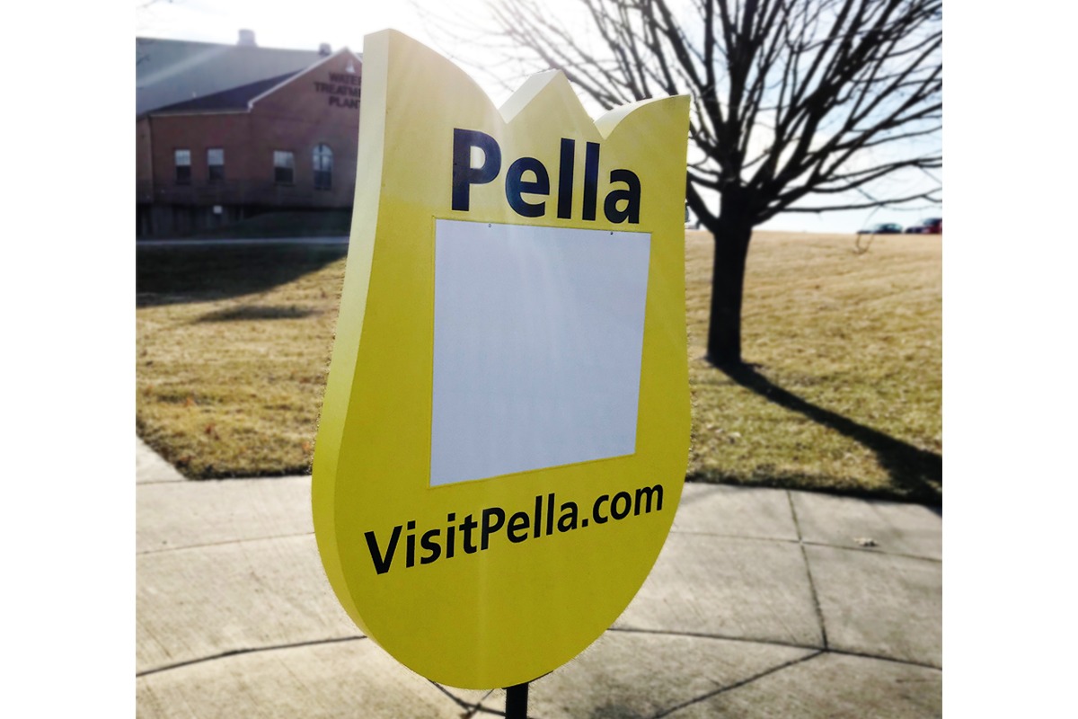 Yellow tulip-shaped freestanding sign in Pella, Iowa