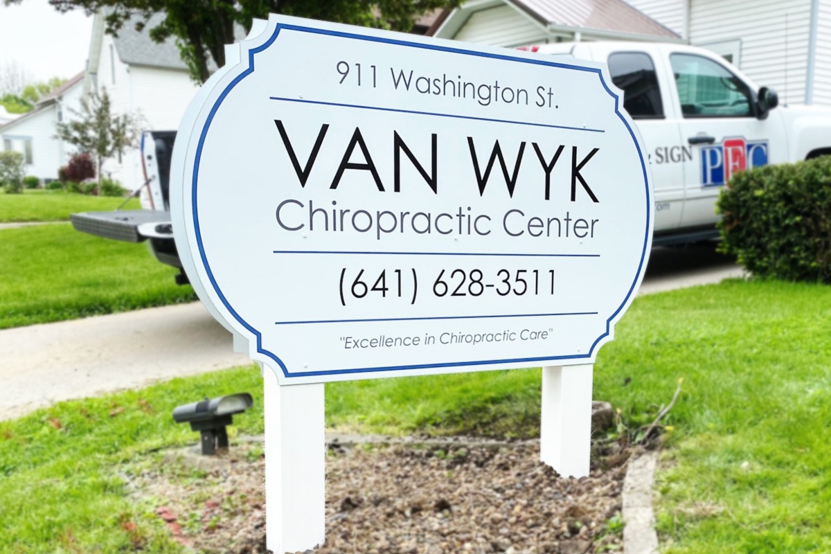 Van Wyk Chiropractic Center white sign in front of office