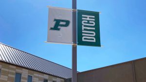 White and green Pella Dutch vinyl banners on lightpole