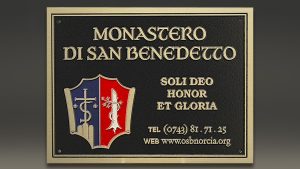 Magnesium plaque with red and blue color-filled shield